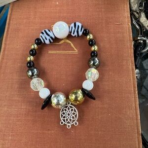 Elegant Beaded Bracelet with Dreamcatcher Charm